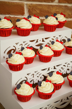 Sweet beautiful cake and other sweets for a child's birthdayの写真素材