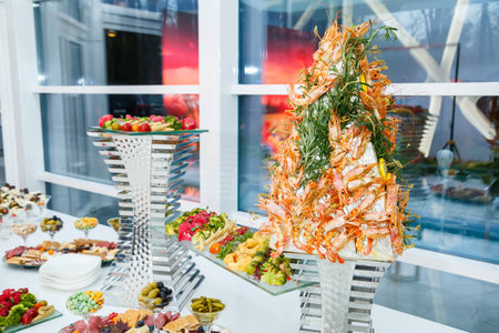 Delicious dish on the buffet table. Cold appetizers from the chef for the celebrationの写真素材