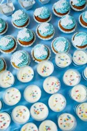 sweet cupcakes and cookies for children on birthdayの写真素材