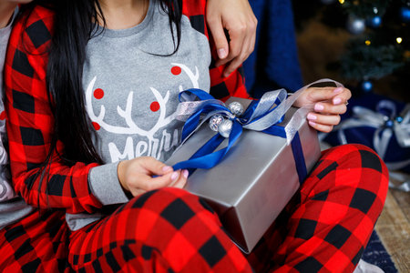 Gifts, gift wrapping, bow on boxes, christmas boxes, hand