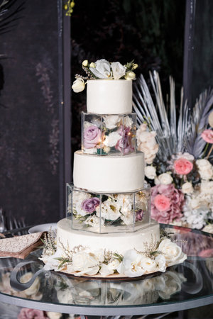 Beautiful tiered delicious dessert sweet cake for newlyweds.の写真素材