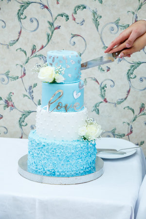 Beautiful and sweet wedding cake for newlywedsの写真素材