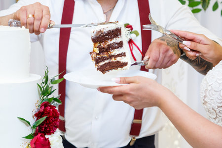 Beautiful and sweet wedding cake for newlywedsの写真素材