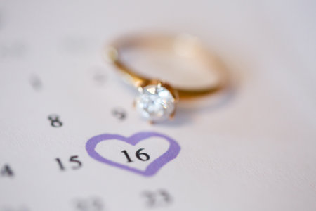 Gold wedding rings for newlyweds on wedding dayの写真素材