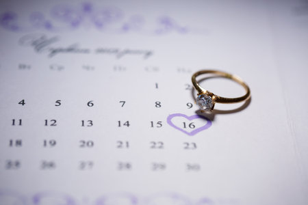 Gold wedding rings for newlyweds on wedding dayの写真素材