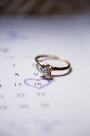 Gold wedding rings for newlyweds on wedding dayの写真素材