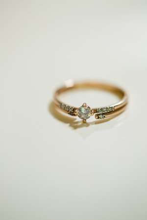 Gold wedding rings for newlyweds on wedding dayの写真素材
