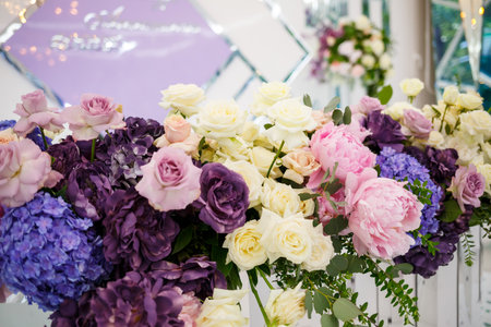 Wedding decor made of flowers and fabric. Beautiful decorations for newlyweds on their wedding dayの写真素材