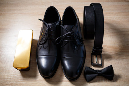 Morning details of a stylish groom with leather shoesの写真素材