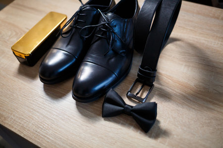 Morning details of a stylish groom with leather shoesの写真素材