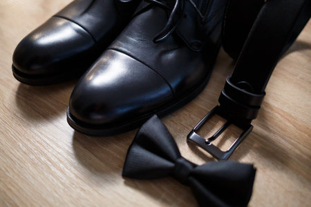 Morning details of a stylish groom with leather shoesの写真素材