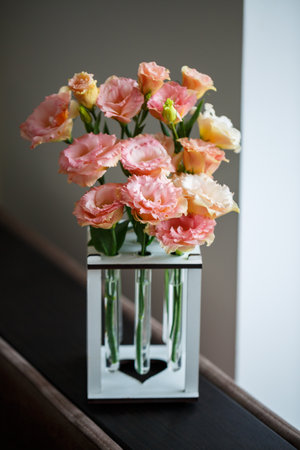 Beautiful flower with leaves standing in a medical test tubeの写真素材