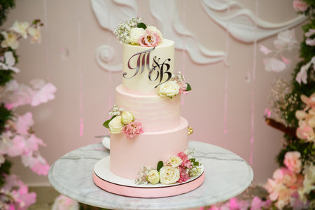 Beautiful tiered delicious dessert sweet cake for newlyweds.の写真素材