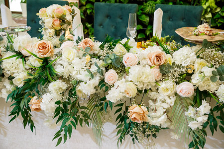 Wedding table decor for newlyweds decorations with fresh flowersの写真素材