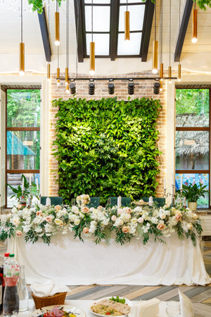 Wedding table decor for newlyweds decorations with fresh flowersの写真素材