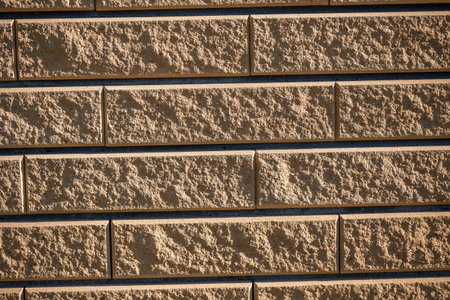 Brown brick. Brick texture, building material, smooth brick laying during repairの写真素材
