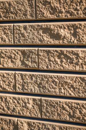 Brown brick. Brick texture, building material, smooth brick laying during repairの写真素材