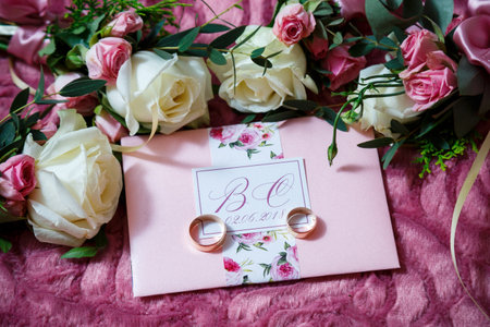 Golden wedding rings for newlyweds on their wedding dayの写真素材