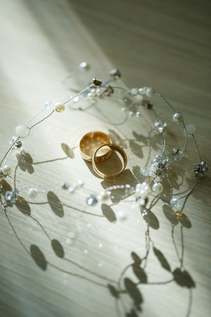 Gold wedding rings for newlyweds on wedding dayの写真素材