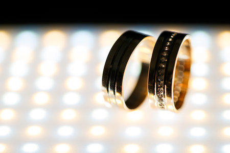 Gold wedding rings for newlyweds on wedding dayの写真素材
