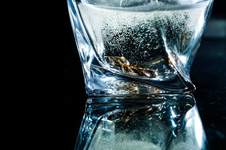 Champagne glasses with engagement Jewelry in front of autumn backgroundの写真素材