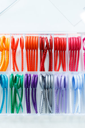 Colored elastic orthodontic bands for braces. Dentistry. Orthodontic treatment of teeth.