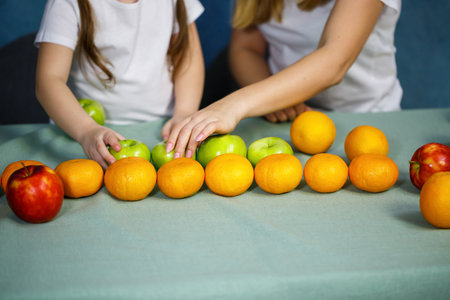bright and fresh fruits laid out on the tableの写真素材