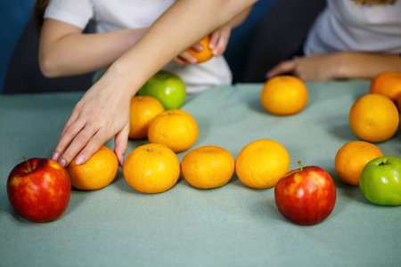 bright and fresh fruits laid out on the tableの写真素材