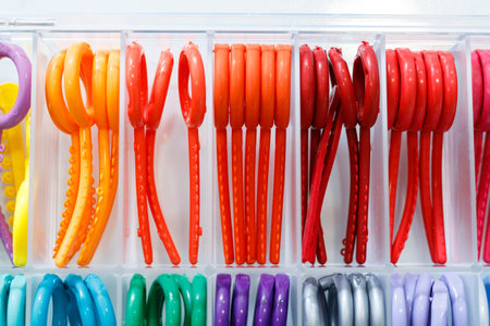 Colored elastic orthodontic bands for braces. Dentistry. Orthodontic treatment of teeth.の写真素材