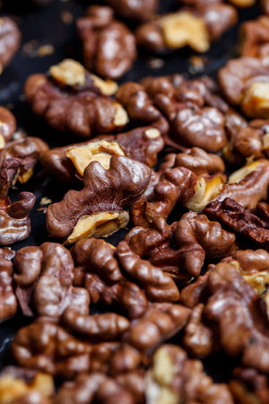 Roasted walnuts. Nuts help the brain work. Fatigue Food, Healthy Nuts. Superfood, vegan, vegetarian food concept. Macro of walnut texture, selective focus. Healthy snackの写真素材