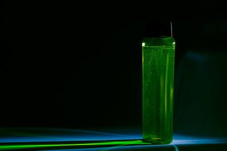 bottle with cream, shampoo for hair, shower gel, colored background, beautiful studio light, beauty...