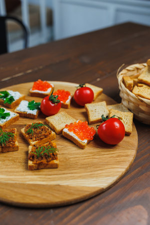 Meat spread on toasted bread with greens. Fresh, delicious croutons made from whole grain breadの写真素材