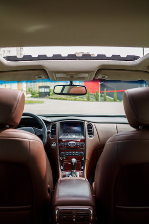 Modern SUV interior with leather panel, multimedia and dashboard