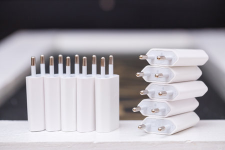 Chargers blocks for charging the phone in white.の写真素材