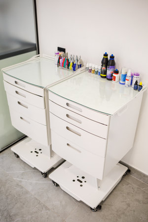 A modern dental office with new equipment and a dental chair. Cabinet for dental treatmentの写真素材