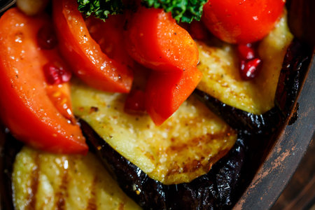 Grilled vegetables in a clay plate.の写真素材