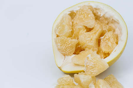 Pomelo fruit isolated on white background, tropical exotic citrus fruitの写真素材