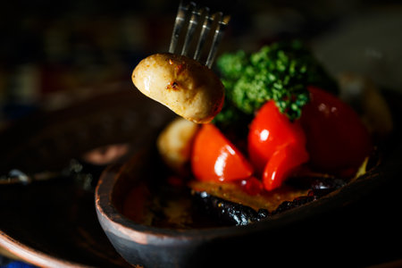 Grilled vegetables in a clay plate.の写真素材