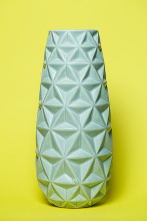 blue decorative flower vase with cut triangle edgesの写真素材