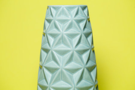 blue decorative flower vase with cut triangle edgesの写真素材