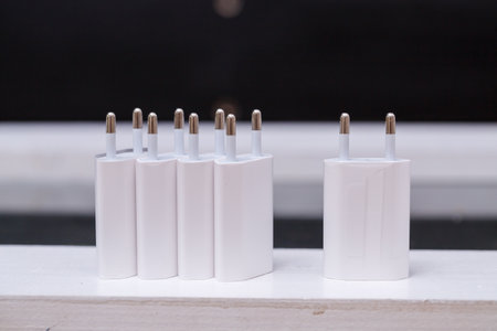 Chargers blocks for charging the phone in white.