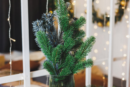 New Year's decor for a festive atmosphere. Decorating the room for Christmas. Golden toys for the Christmas treeの写真素材