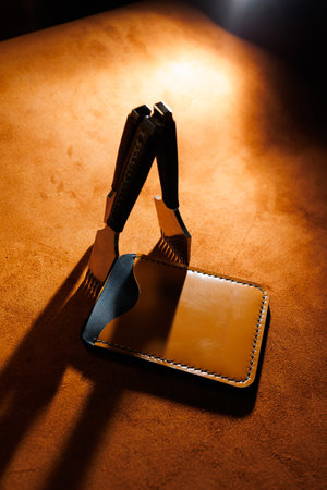Tools for making leather goods and pieces of brown leather. Production of leather products. View...