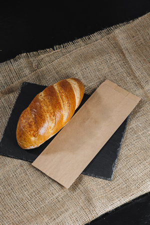 Delicious freshly baked homemade bread. Rye pastry. Flour bakery products.