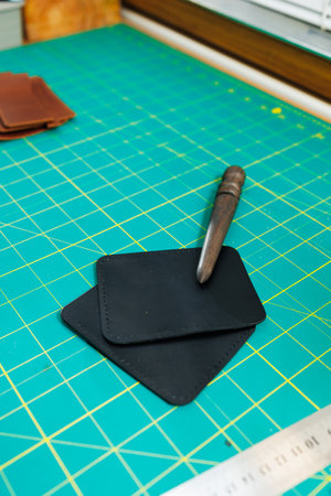 A work table for the manufacture of products from genuine leather. Tools for manual leather work