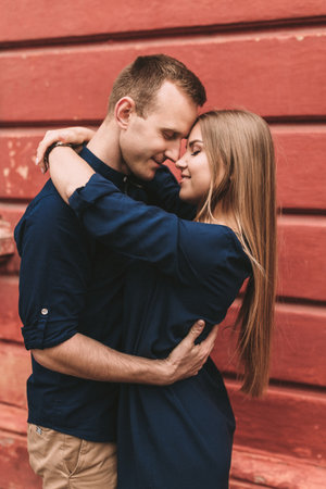 Happy young couple. The concept of a happy family with strong feelings. Young people in loveの写真素材