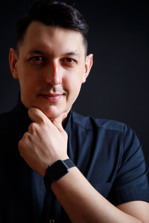 Close-up portrait of a young male doctor in medical clothes.の写真素材