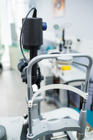 Microscopic apparatus for testing eyesight. Ophthalmology and treatment of eye diseases. Eye clinic, optometrist conceptの写真素材