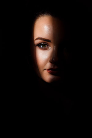 Portrait, close-up, attractive girl one eye is visible