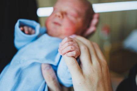 Newborn baby's hand close-up. A child's hand with a small palm